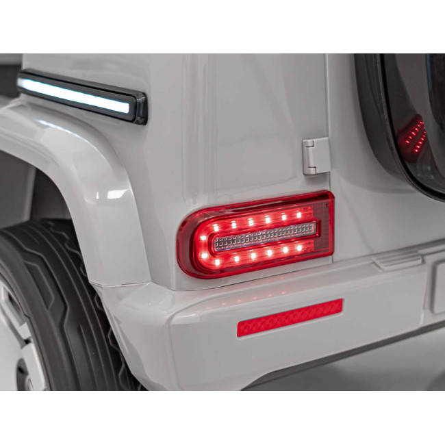 Детская аккумуляторная машинка Mercedes Benz EQG Серая