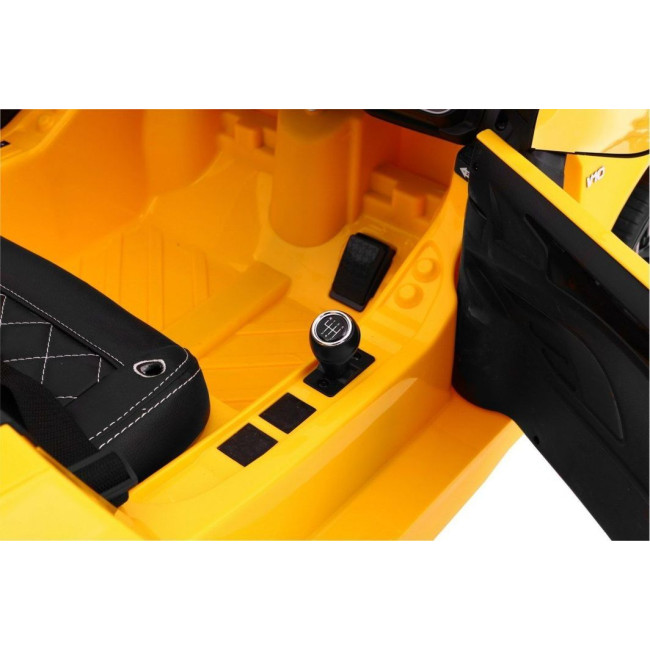 Детская аккумуляторная машинка Audi R8 Spyder Желтая