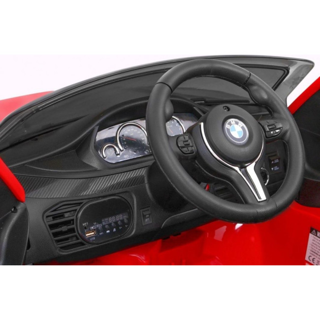 Детская аккумуляторная машинка BMW X6M Красная