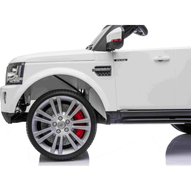 Детская аккумуляторная машинка Land Rover Discovery Белая