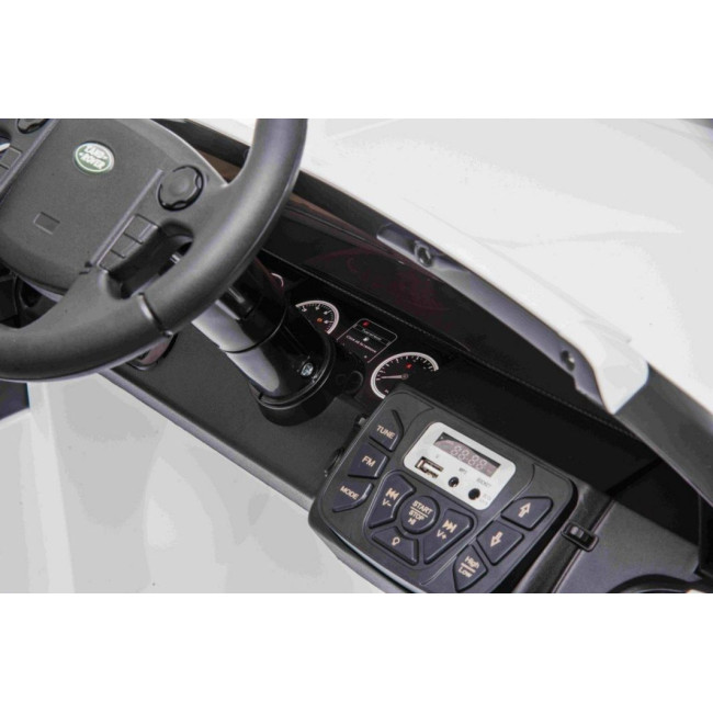 Детская аккумуляторная машинка Land Rover Discovery Белая