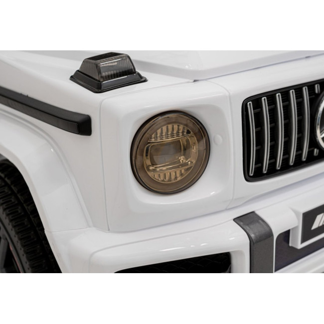 Детская аккумуляторная машинка Mercedes AMG G63. Белая