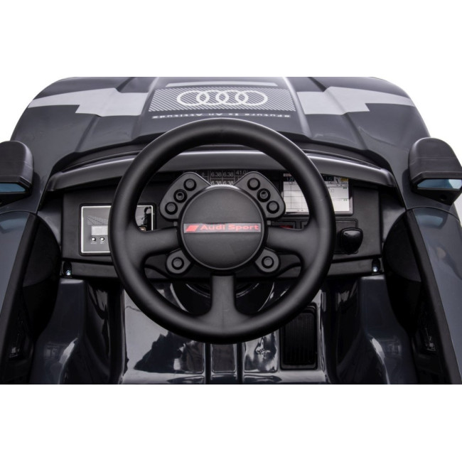 Детская аккумуляторная машинка Audi RSQ E-TRON Серая